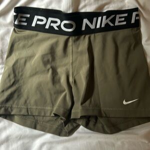 green nike pros